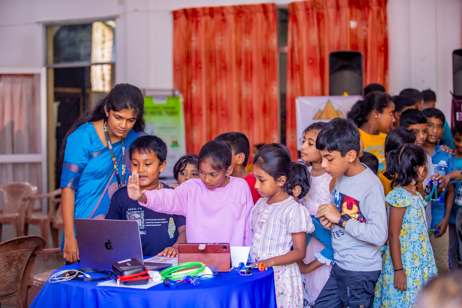 Children discovering technology at SPM Academy